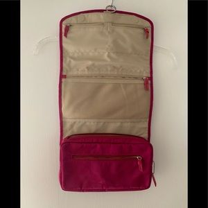 Coach Pink Travel Bag with Hanging Hook and Compact Design